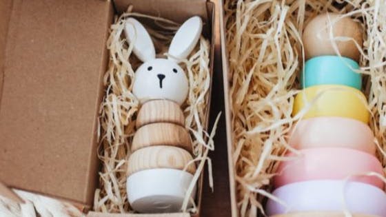 Colorful baby toys in a box