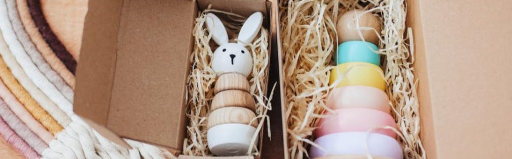 Colorful baby toys in a box