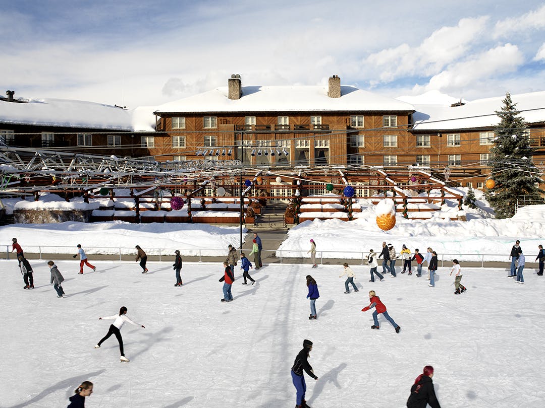 Ice skaters skate at the rink outside Sun Valley Lodge.