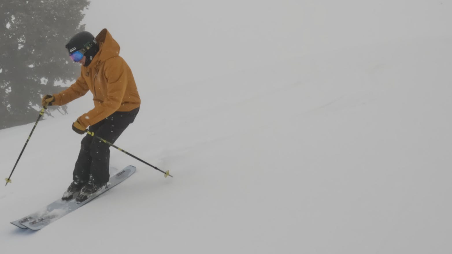 Curated Ski Expert Brendan Westburg on the 2023 Salomon QST Blank skis in foggy conditions