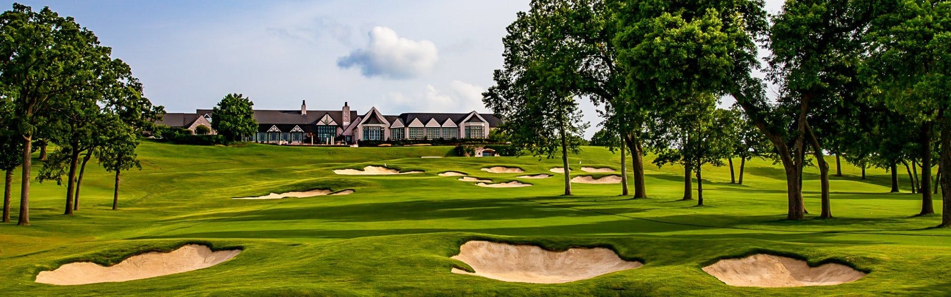 The course at Southern Hills Country Club in Tulsa, Oklahoma with the clubhouse visible in the background.