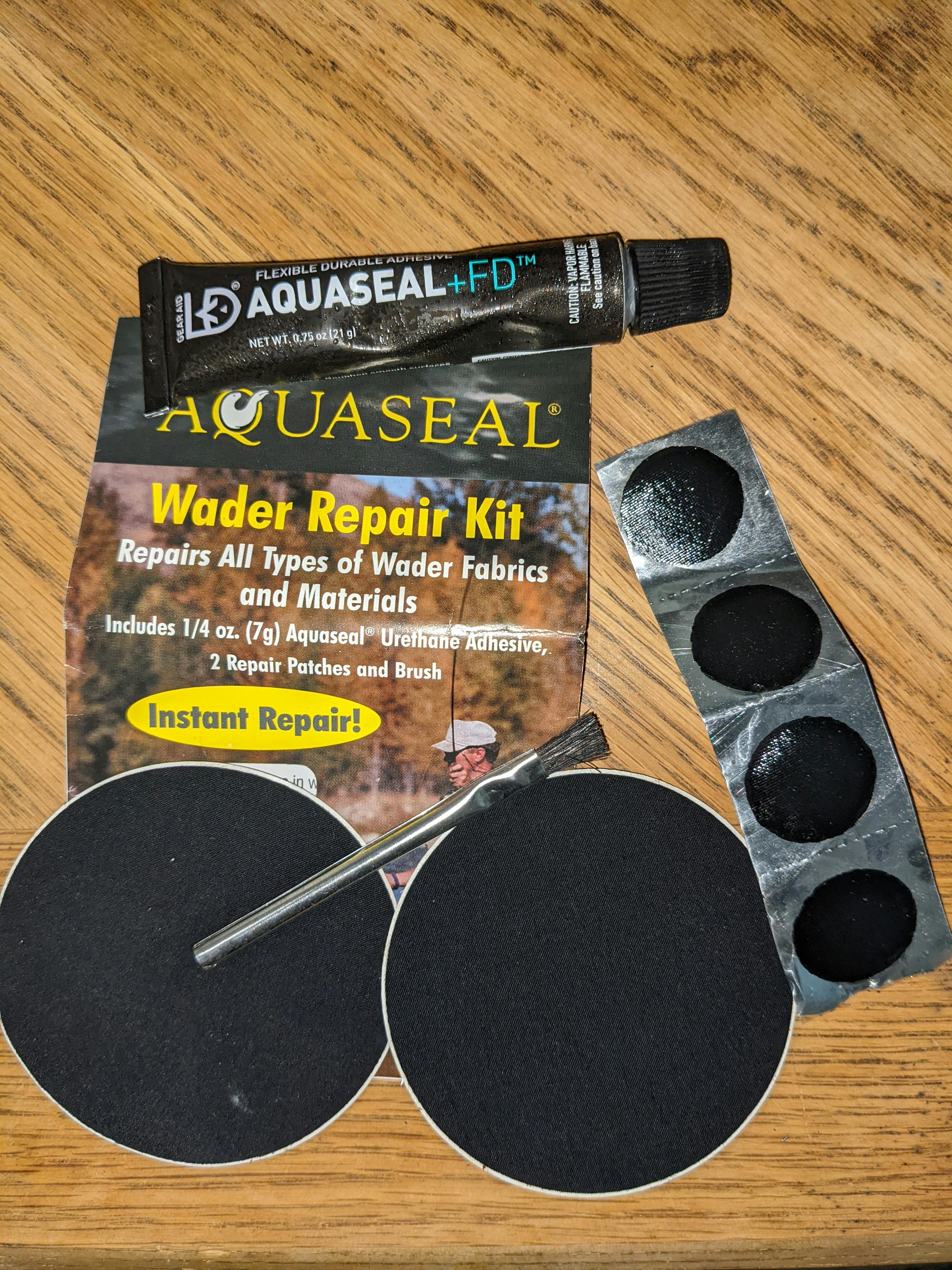 A compact wader field repair kit.