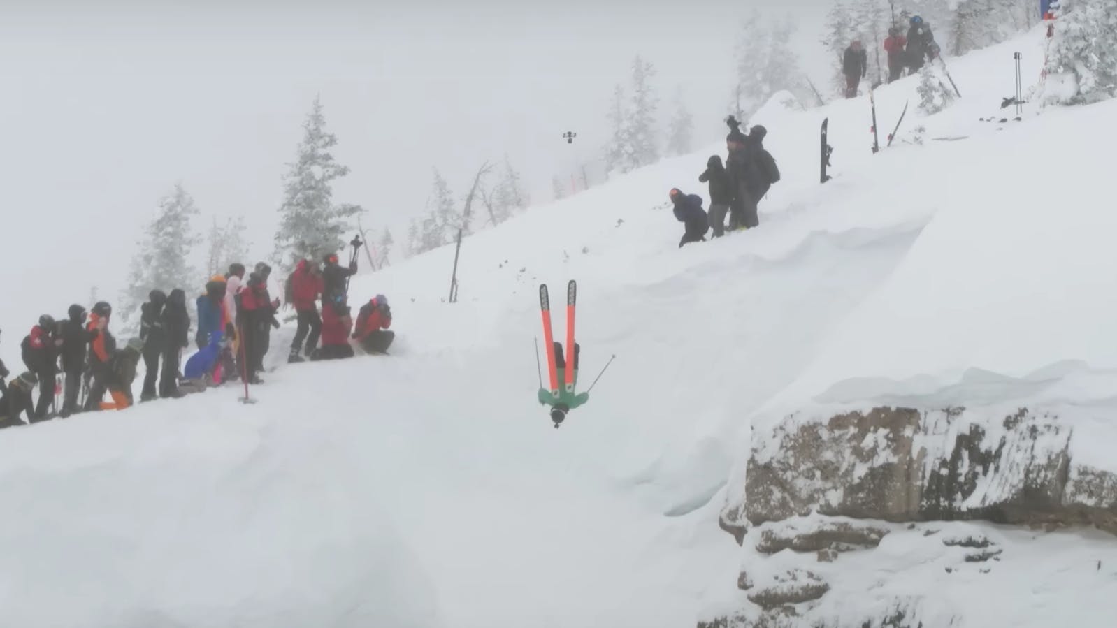 A skier drops into Corbet's coulier upside down for Kings and Queens of Corbet's. Photo comes from screenshot of Jackson Hole Mountain Resort's YouTube video "KINGS & QUEENS: MIND-BLOWING MOMENTS."