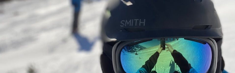 A snowboarder wearing the Smith Level Helmet in the Liberty Bowl of Big Sky. 