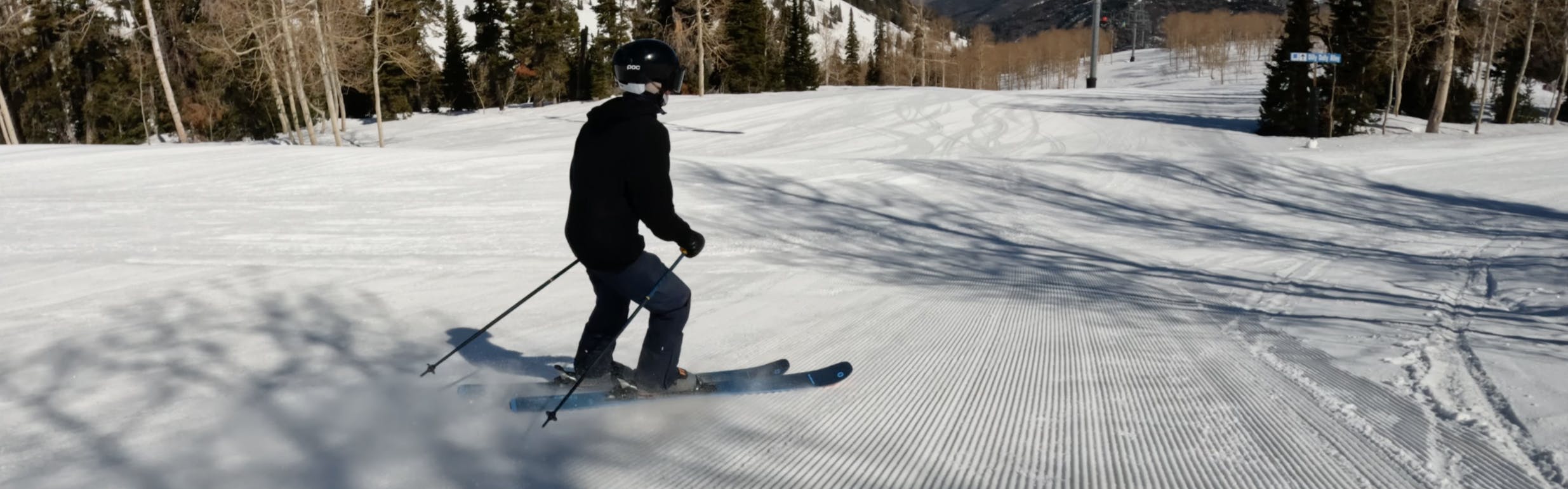 A skier on the 2023 Blizzard Black Pearl 88 Skis.