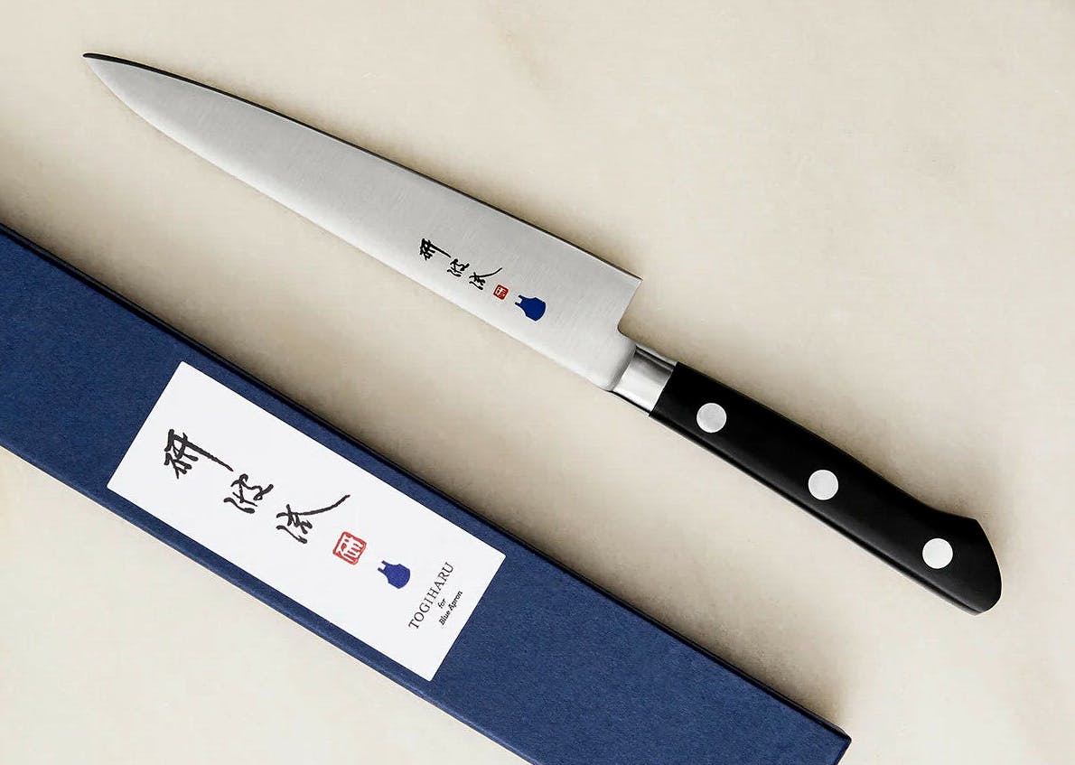 Togiharu logo on a knife.