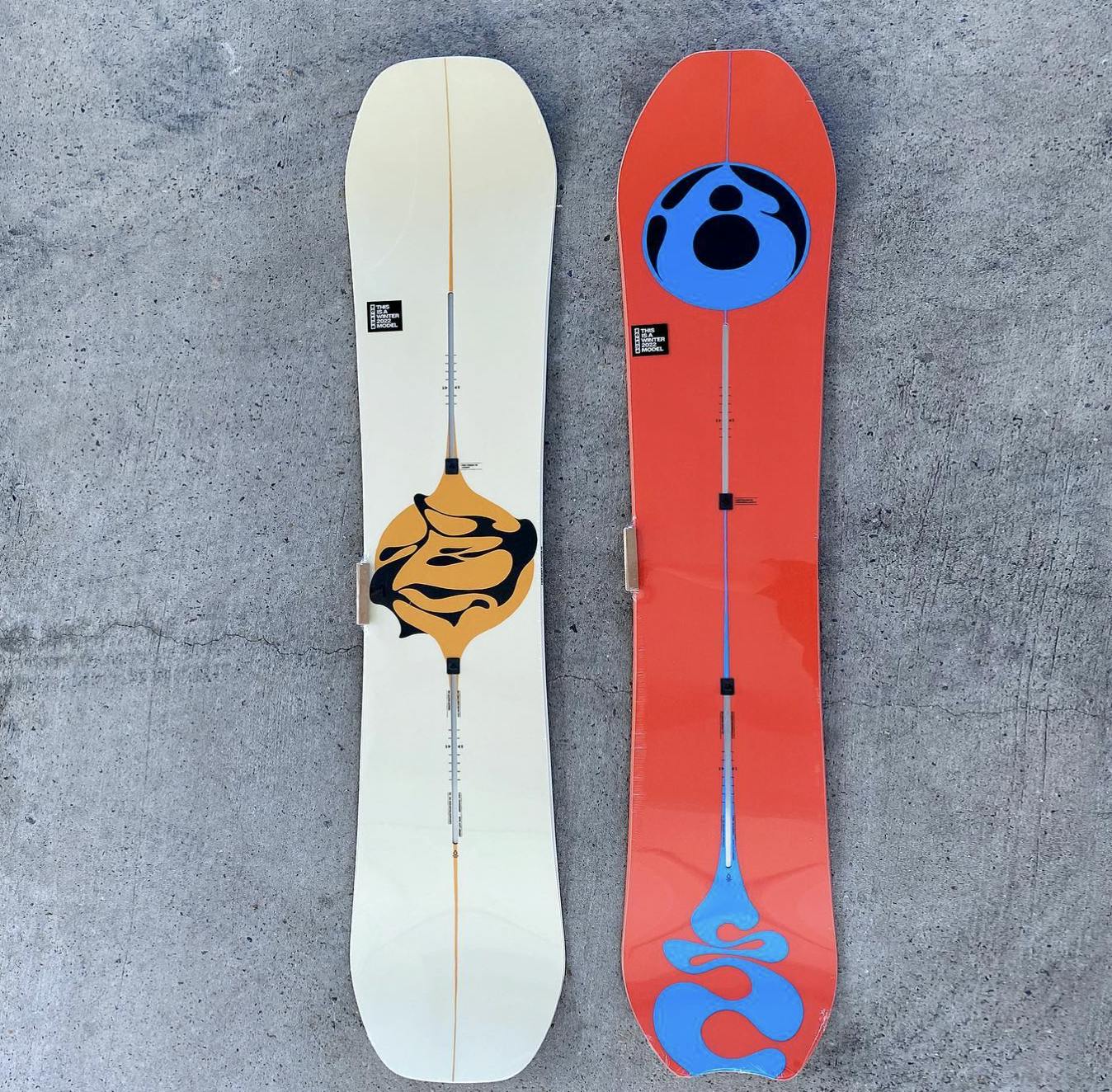The Burton Deep Thinkwe snowboard next to a Burton Freethinker snowboard. 