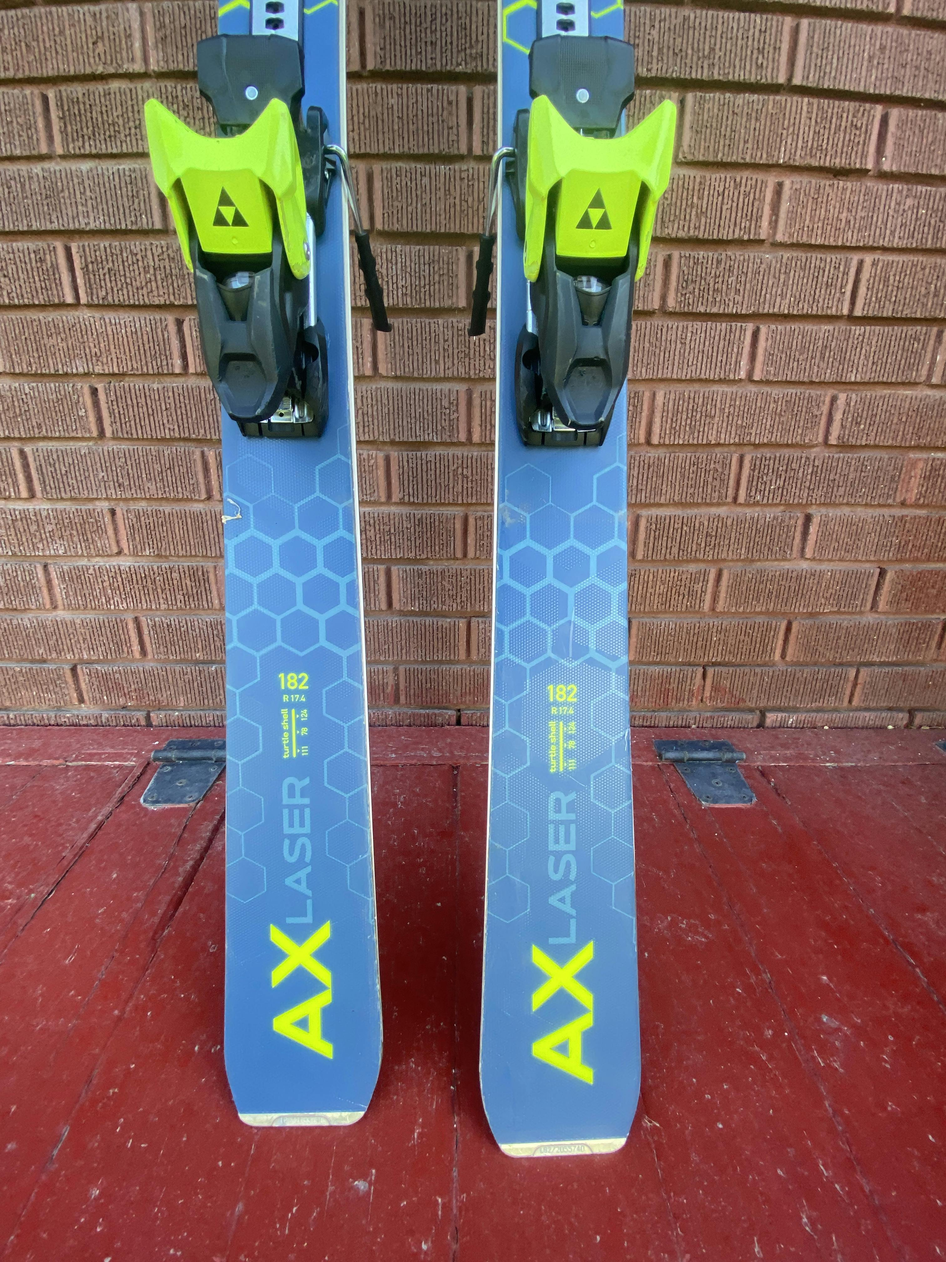 The tail and back binding of the Stockli Stockli Laser AX Skis W Dxm 13 Bindings.