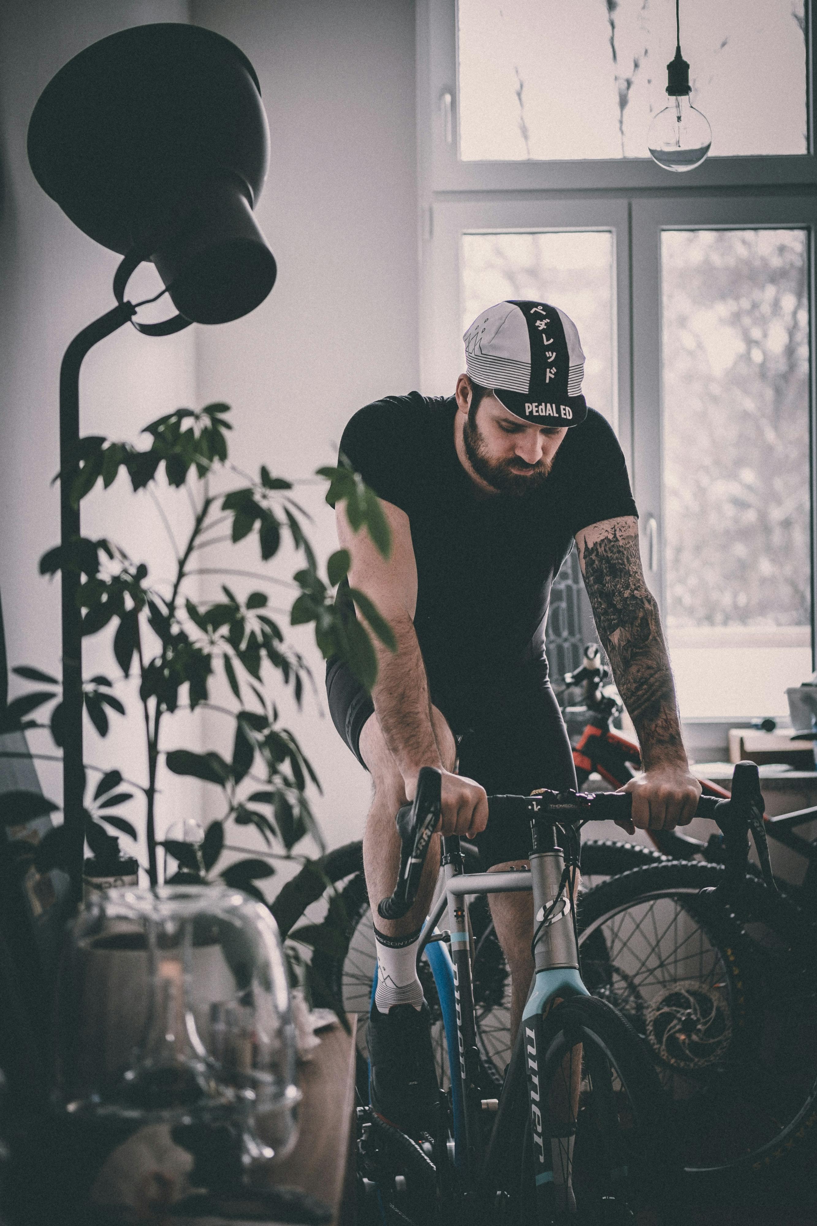 A man on an indoor bike. 