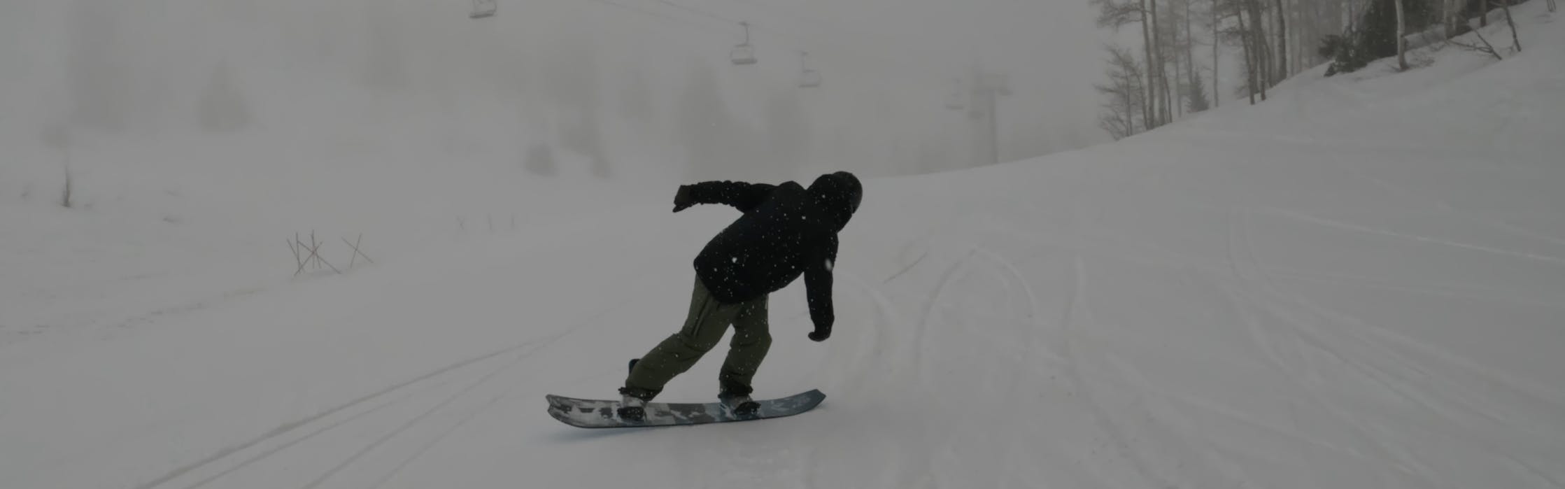 A snowboarder on the Yes. Warca Snowboard. 