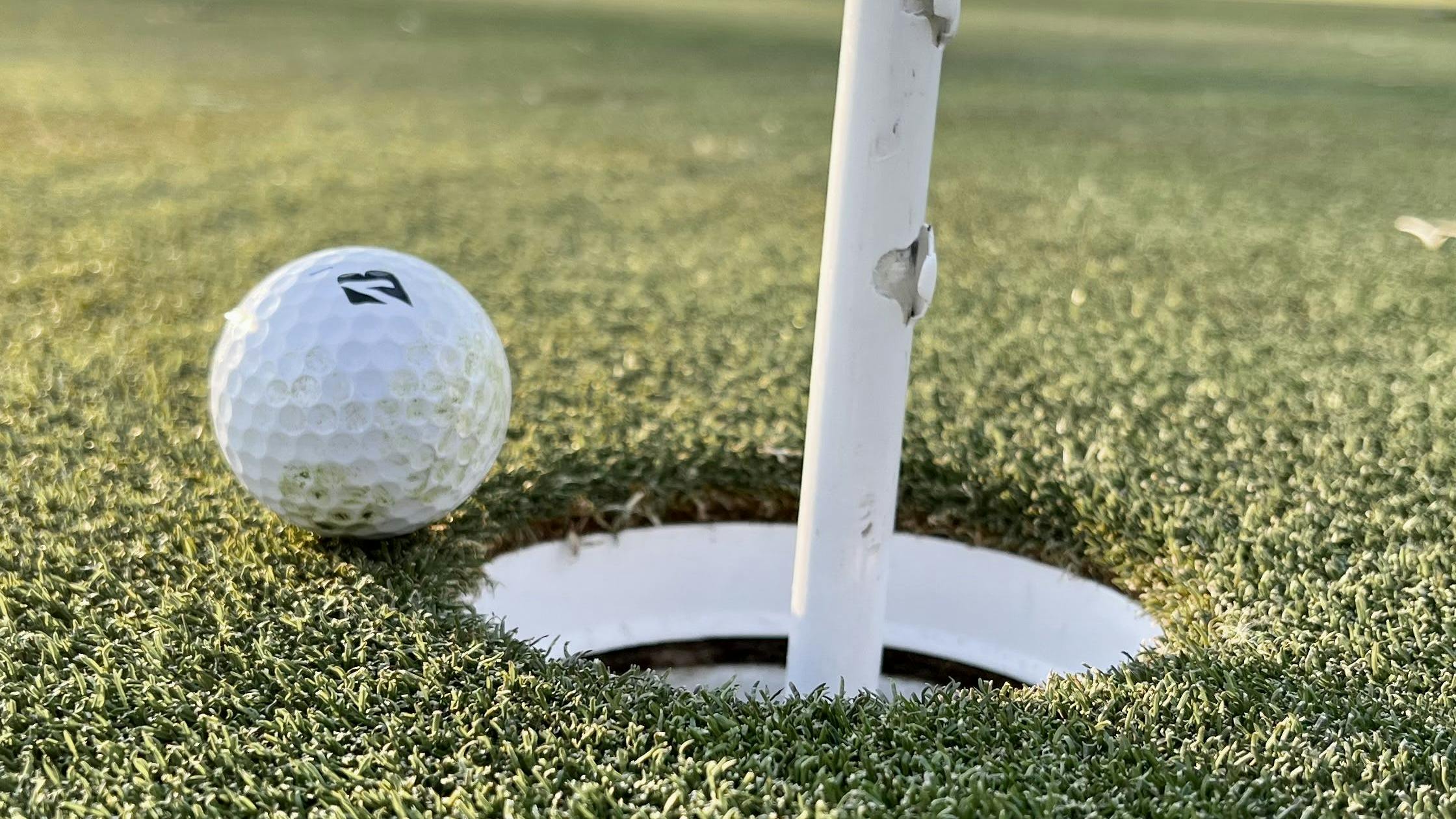 A Bridgestone 2020 Tour B RXS Golf Ball.