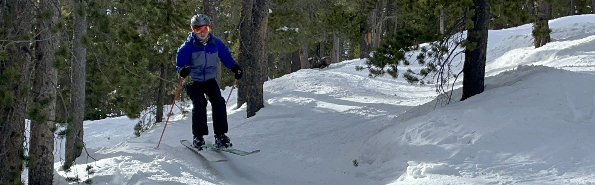 A skier on the  DPS Pagoda 100 RP Skis · 2023. 