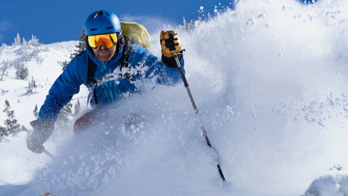 Skier wearing the POC Fornix MIPS helmet.