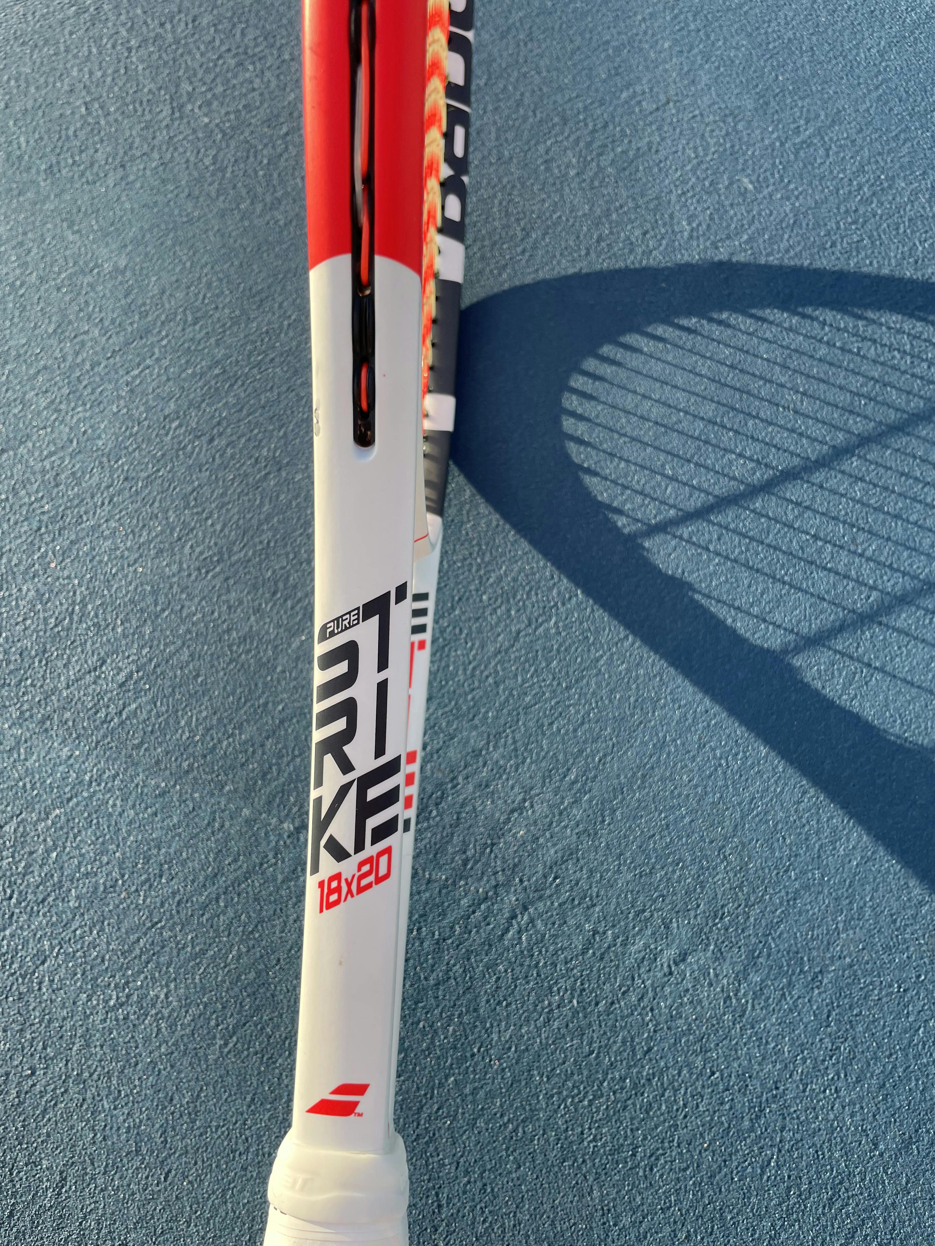 Side details on the Babolat Pure Strike 18x20 Racquet.