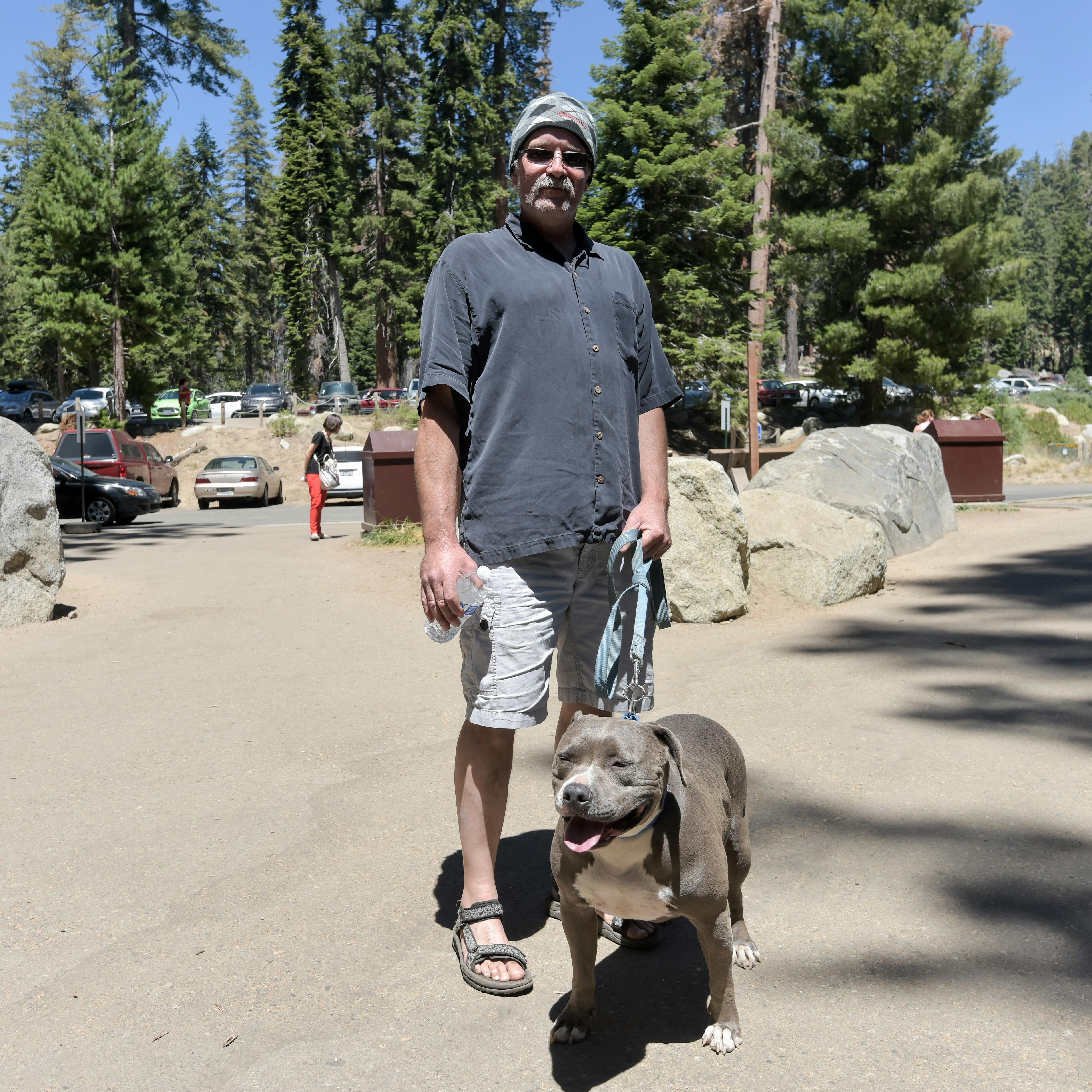 A man and his dog near the Visitor Center in Sequoia National Park.
