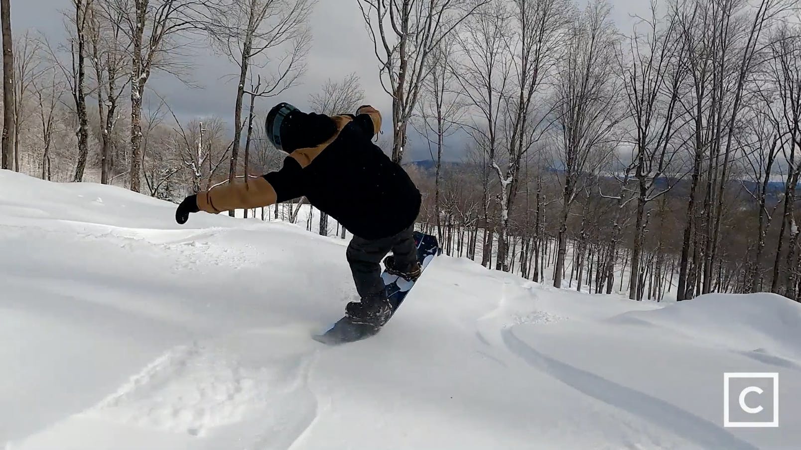 Curated expert Colby Henderson buttering in fresh snow with the Lib Tech Orca