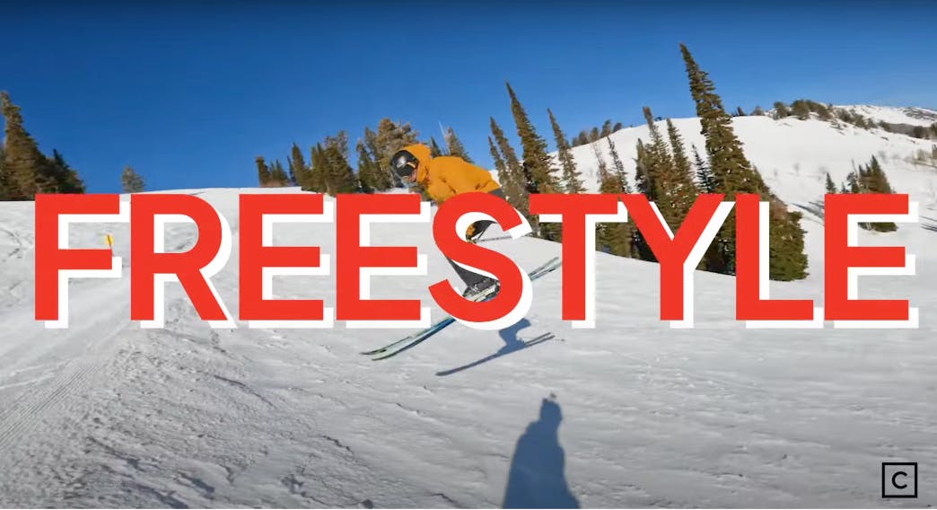 A skier with the word "freestyle" overlayed.