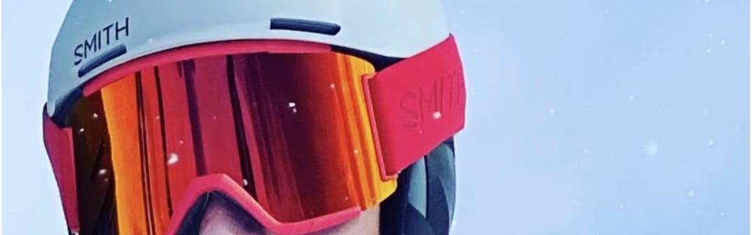 Close up of a man wearing the Smith Vantage MIPS Helmet with goggles.