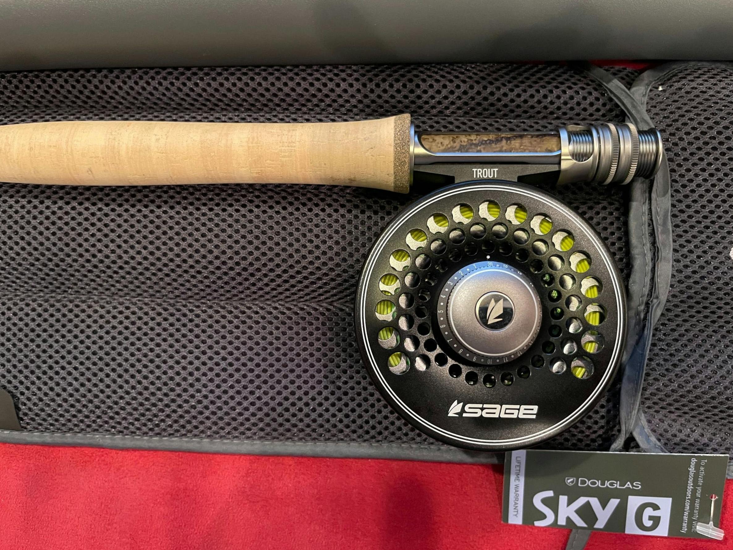 Close up of a Sage reel attached to the Douglas SKY G Fly Rod.