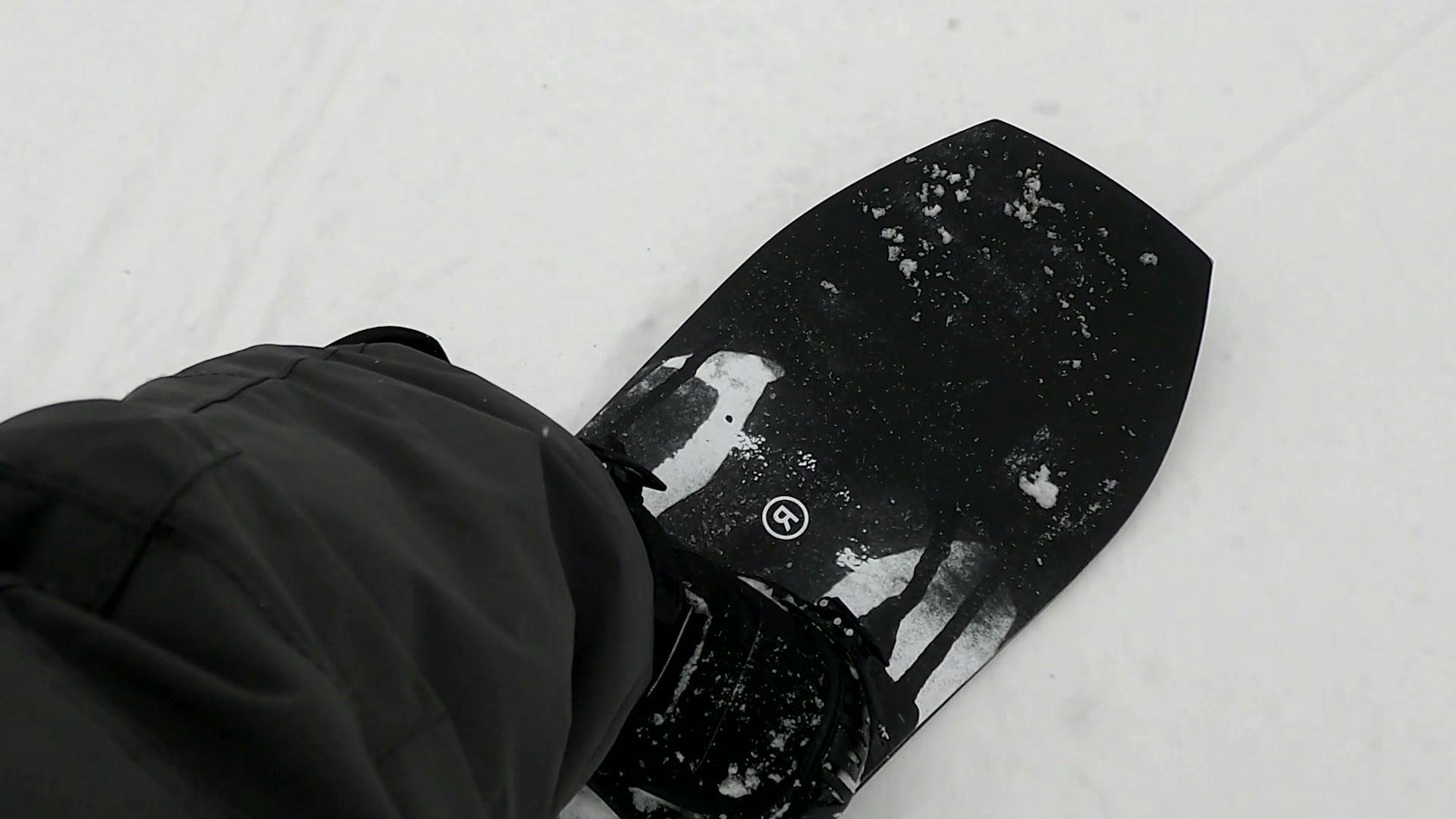 Closeup on the Ride Twinpig snowboard