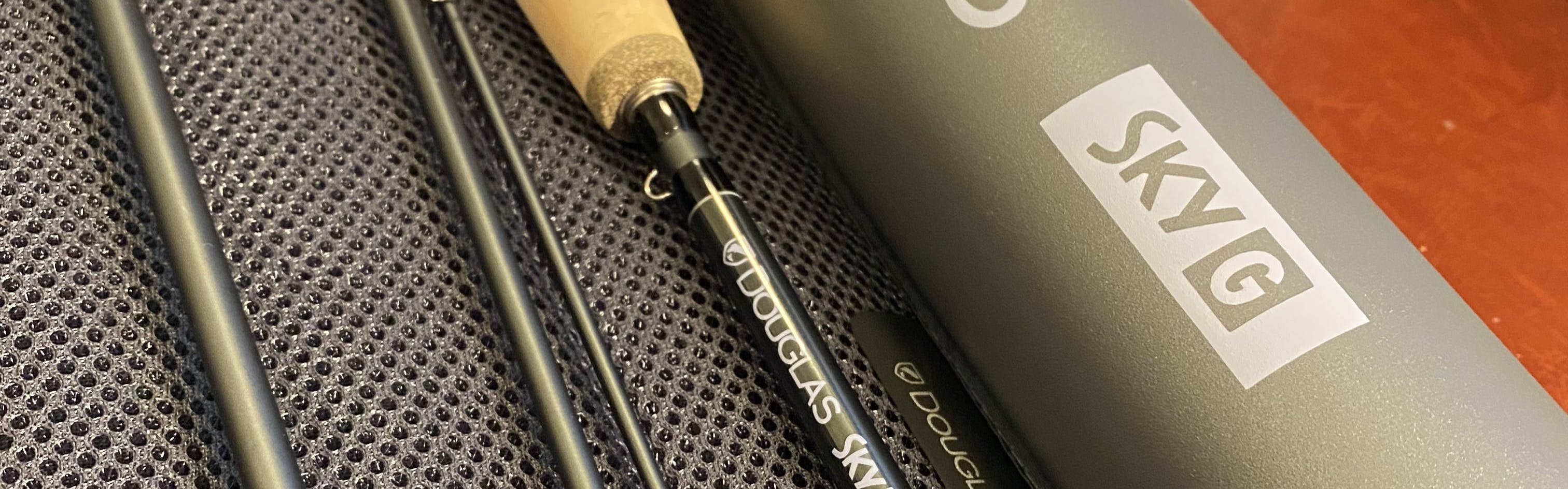 Close up of the Douglas SKY G Fly Rod in its case.