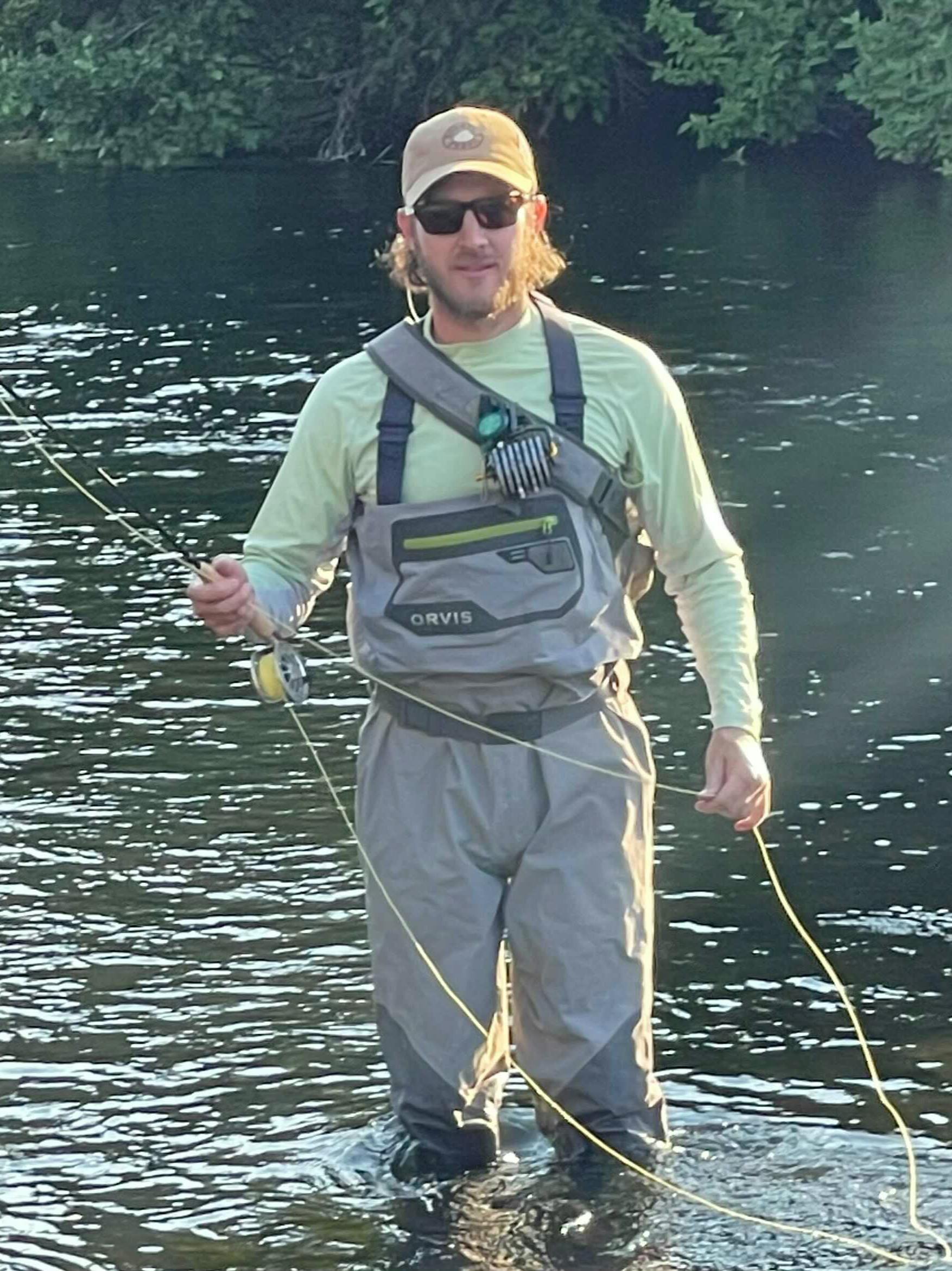Curated Expert Charles Edington, fishing and wearing the Orvis Ultralight Convertible Waders