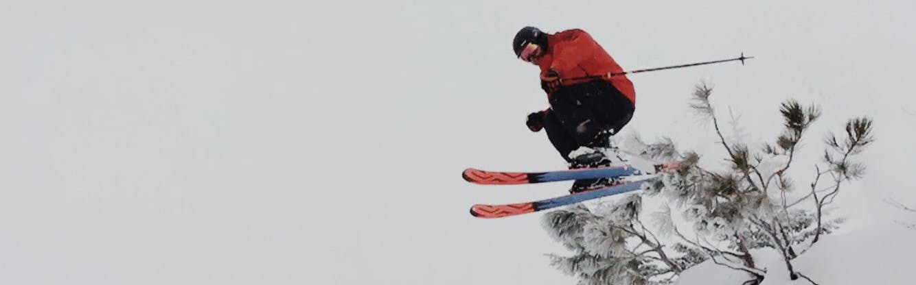 A skier on skis with the Marker Jester 16 ID Ski Bindings. 