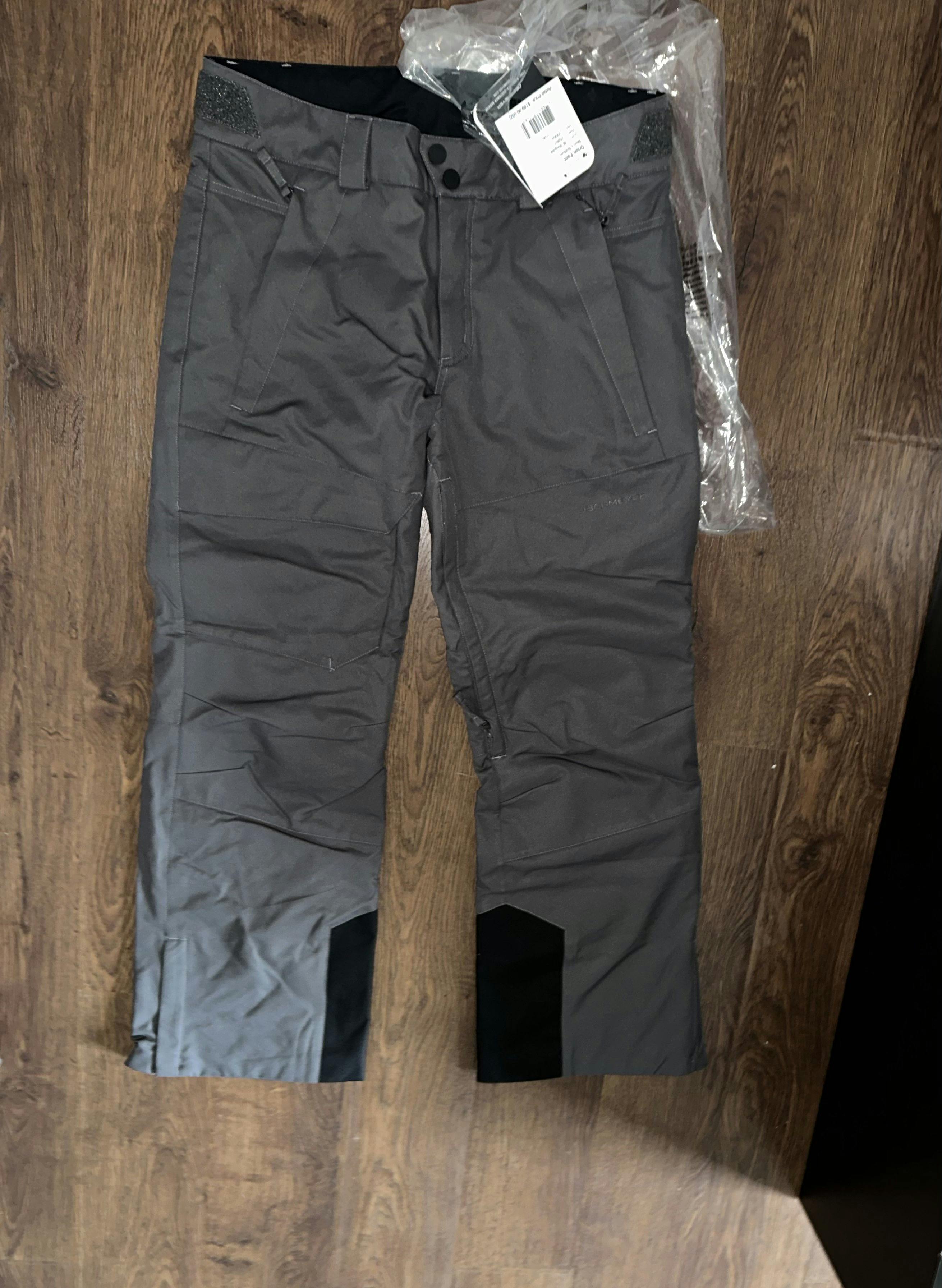 The front of the Obermeyer Men's Orion Pants. 