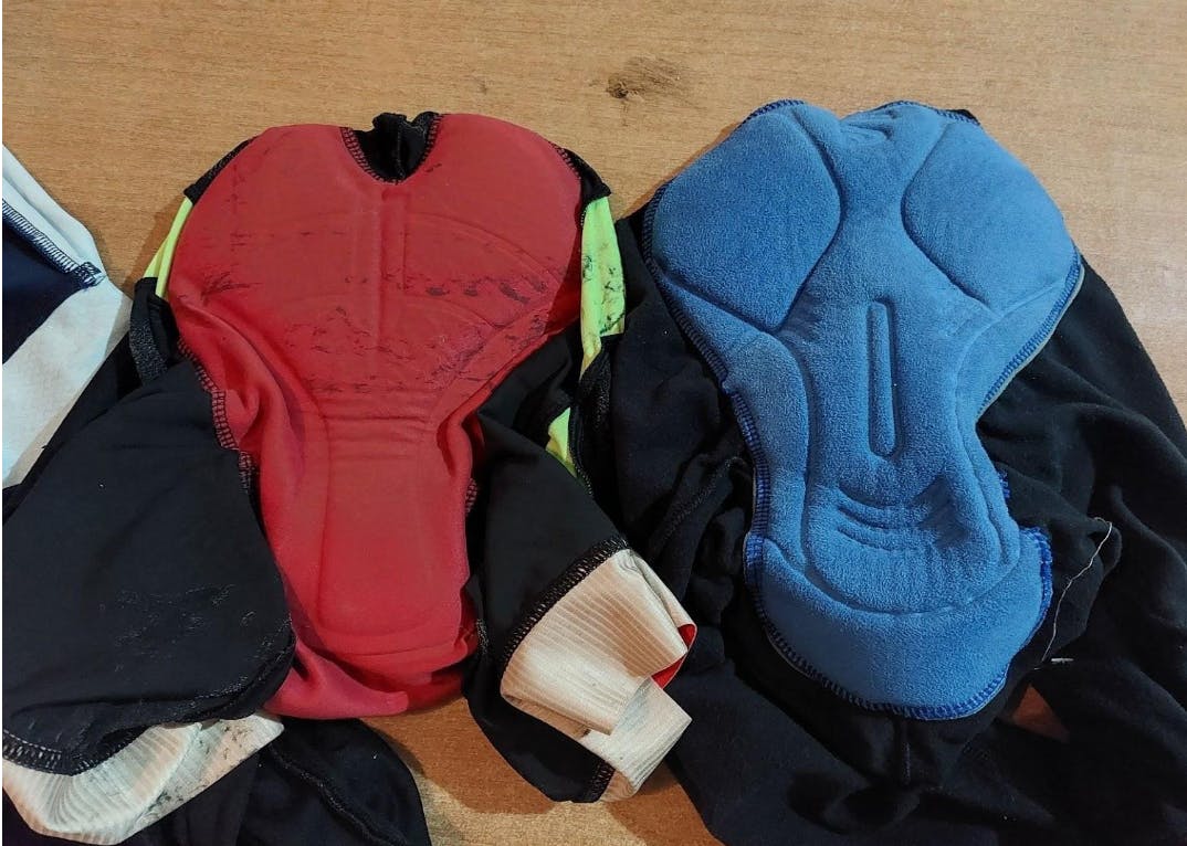 A male and female cycling pad next to each other. 
