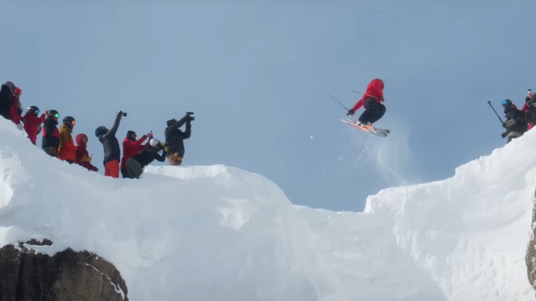 A screenshot from Jackson Hole Mountain Resort's YouTube page shows a skier jumping into the coulier.