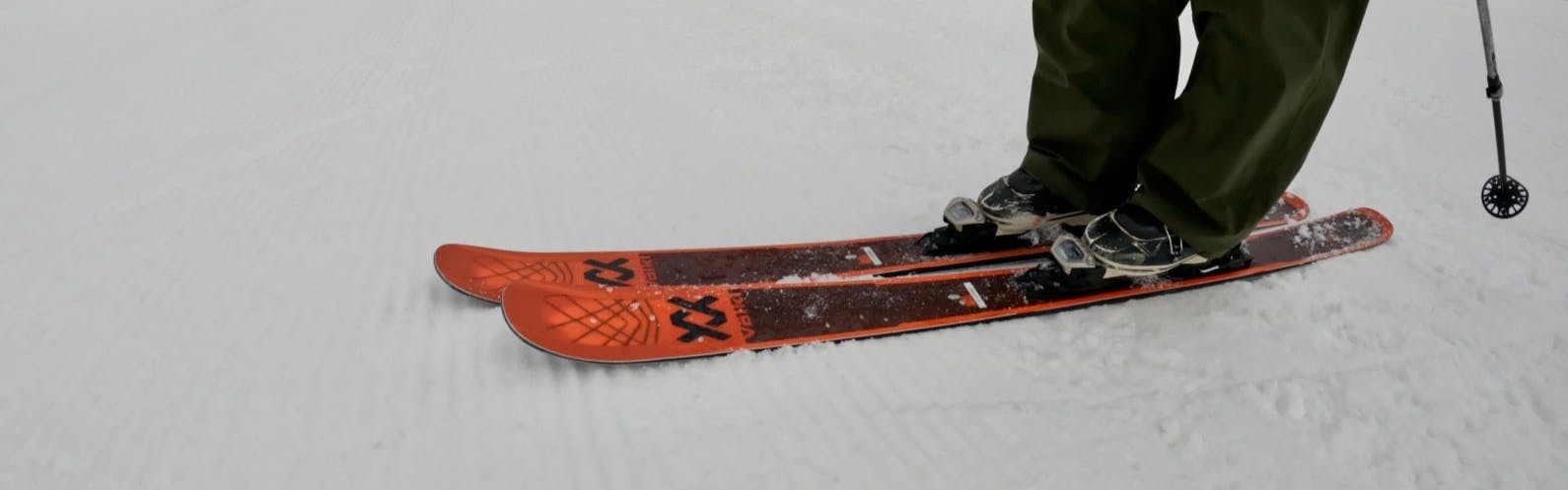 Closeup on the 2023 Volkl M6 Mantra skis in the snow