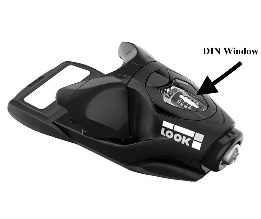 A black ski binding with an arrow and label of "DIN window"