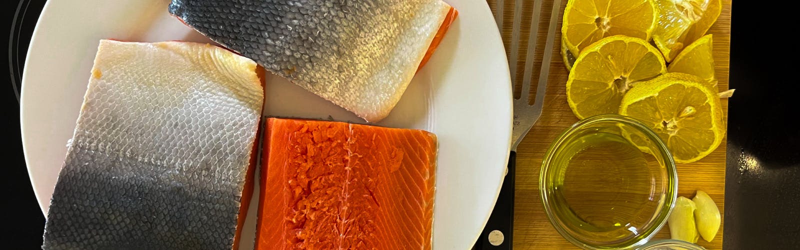 Raw salmon fillets on a plate