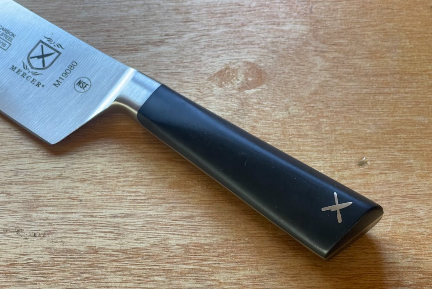 Handle on the Mercer ZUM 8-in Chef's Knife.