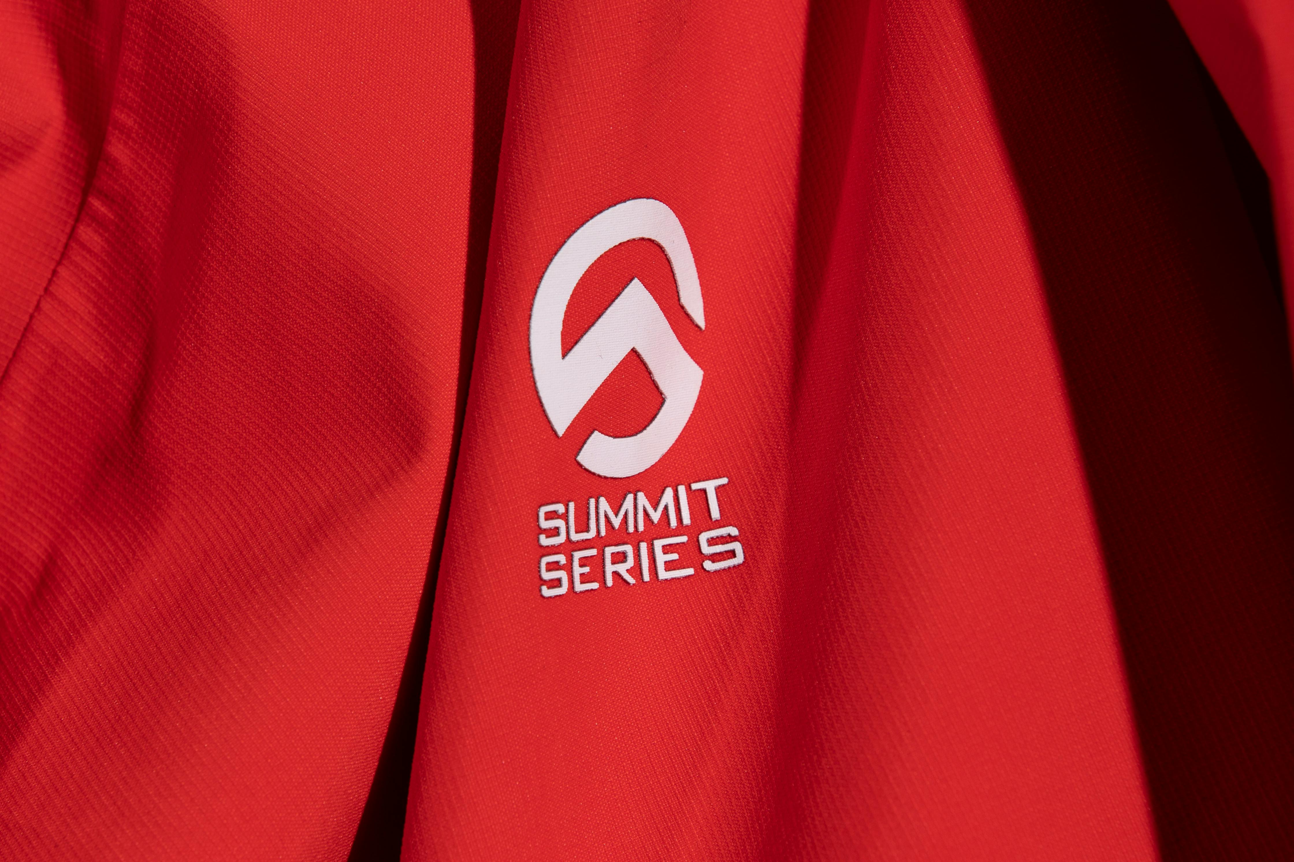 A closeup of a red Summit Series jacket from The North Face.