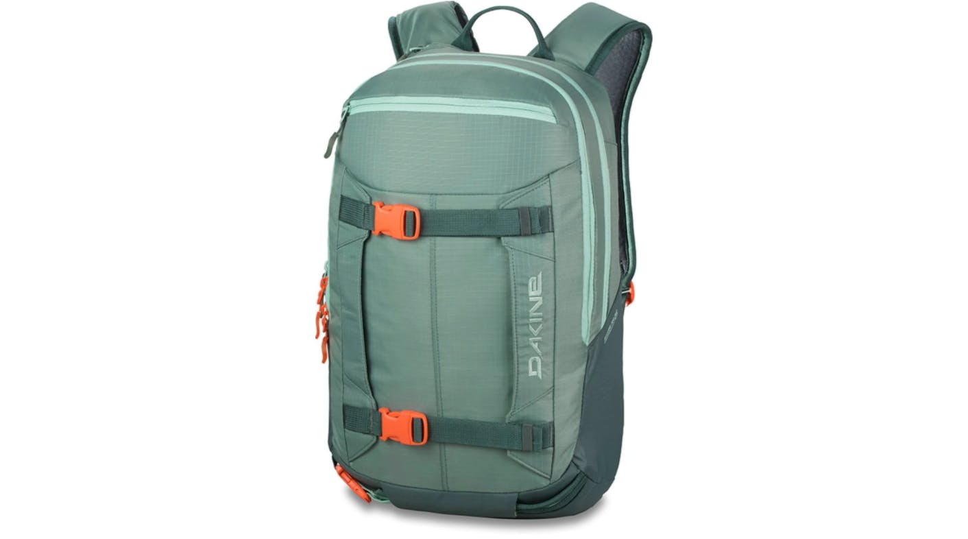A blue Dakine Mission Pro 18L backpack.