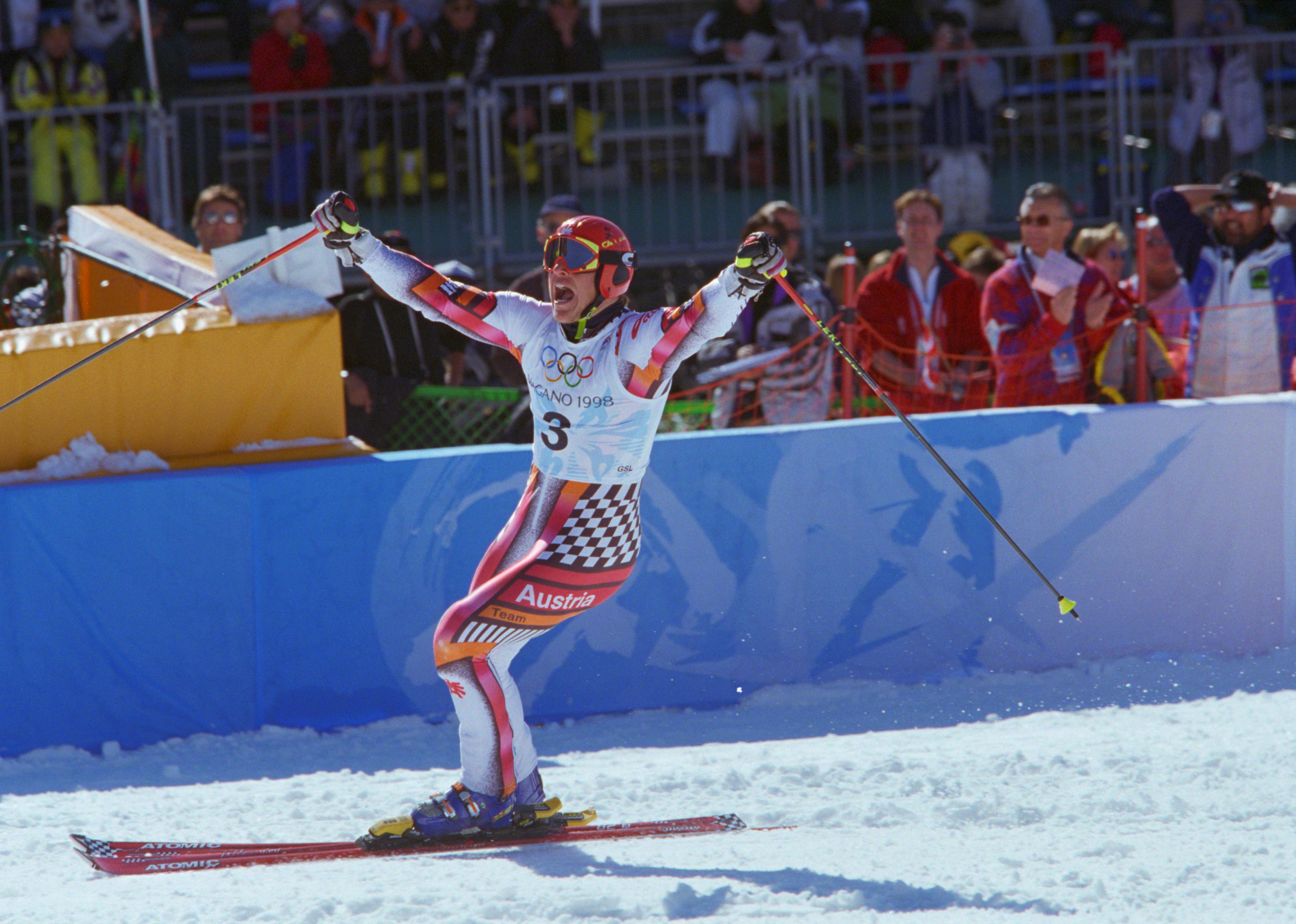 Hermann Maier celebrating at the bottom of the ski run