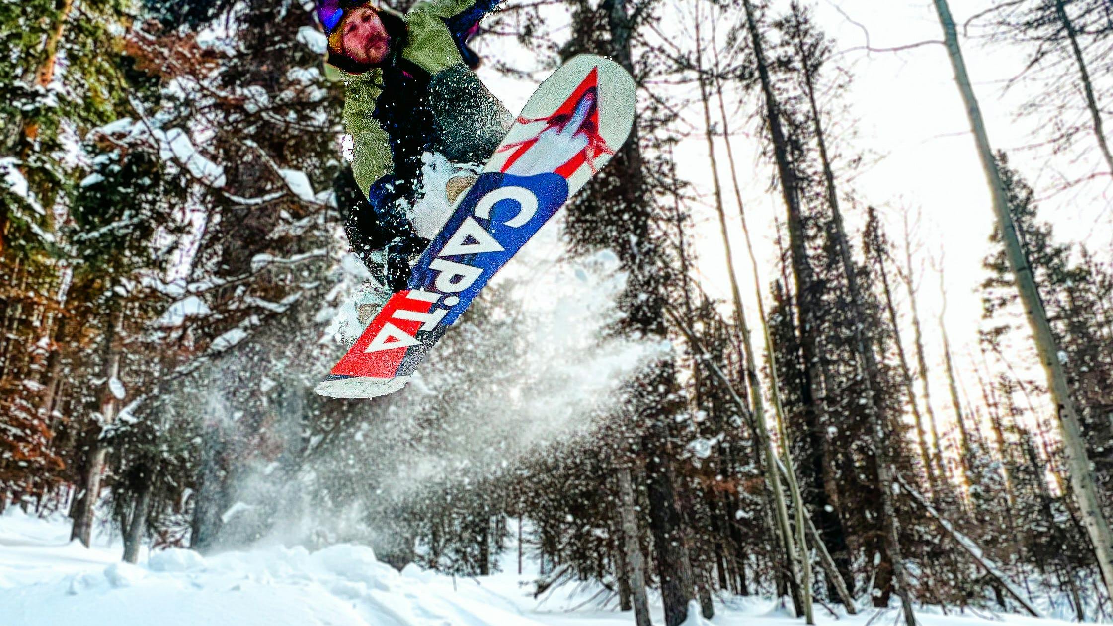 A snowboarder jumping off a jump in the Burton Moto BOA Snowboard Boots · 2021.