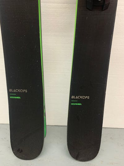 Tips of the Rossignol Black Ops Holy Shred Skis.