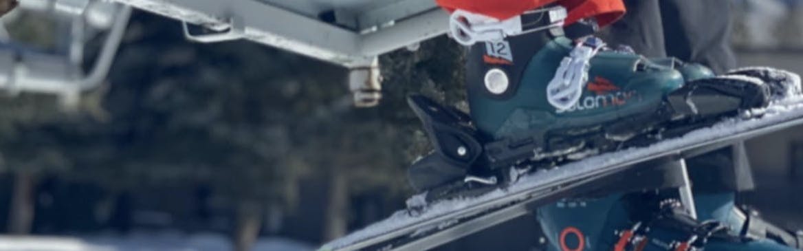 The Salomon Shift Pro 120 AT Ski Boots on a chairlift.