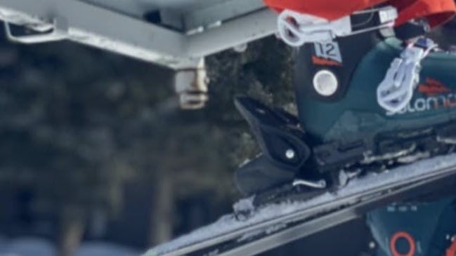 The Salomon Shift Pro 120 AT Ski Boots on a chairlift.