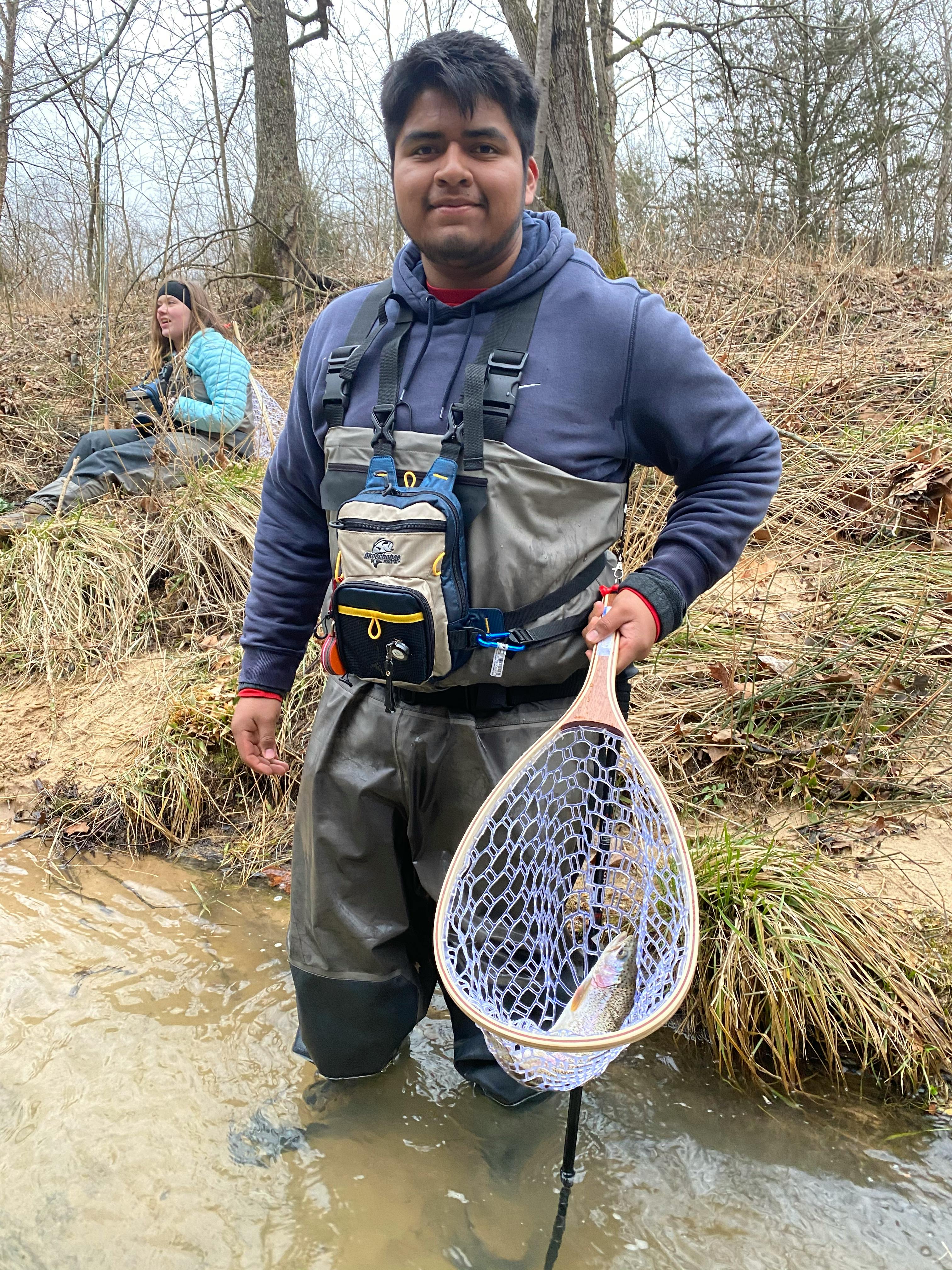 Student using the Orvis Encounter Rod in a river.