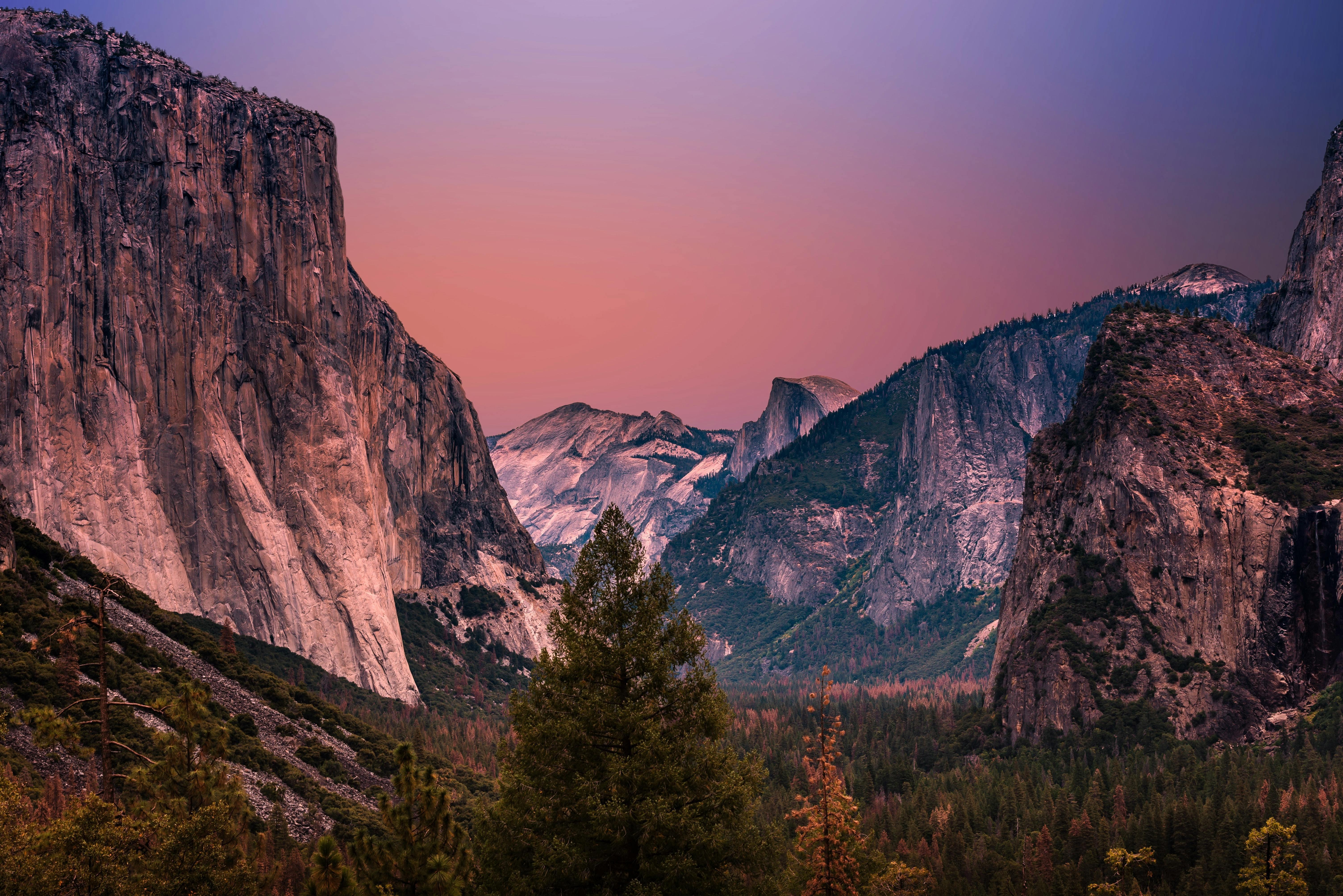 A sunset view of Yosemite National Park from the iconic Tunnel View viewpoint. 
