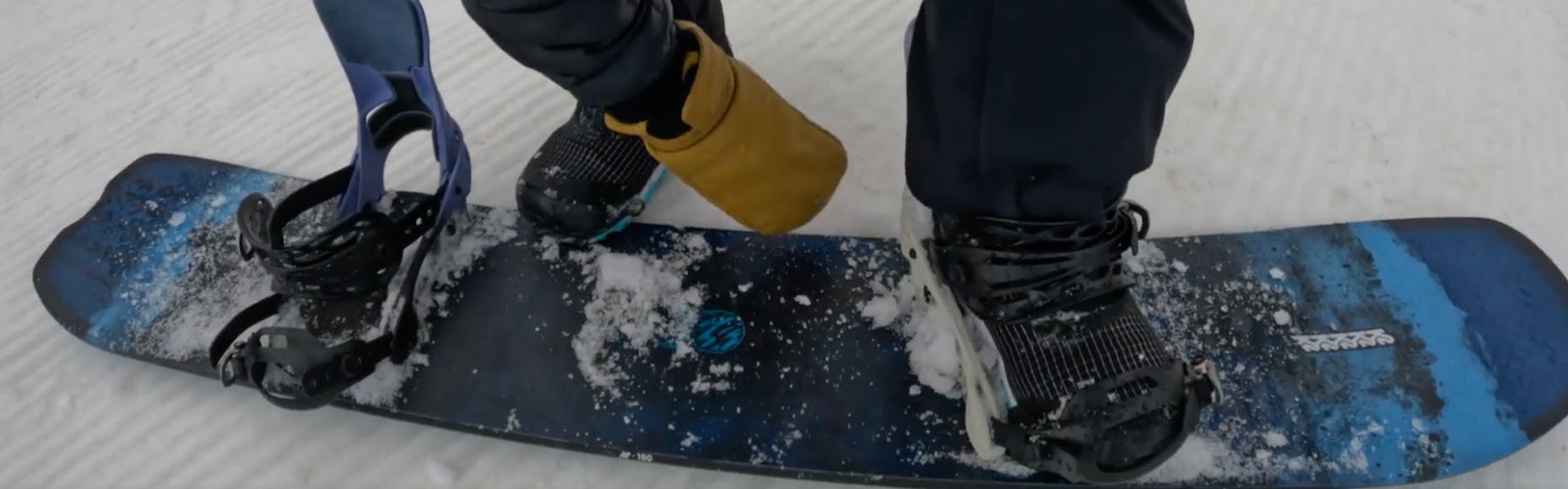 Strapping into the 2023 K2 Alchemist snowboard