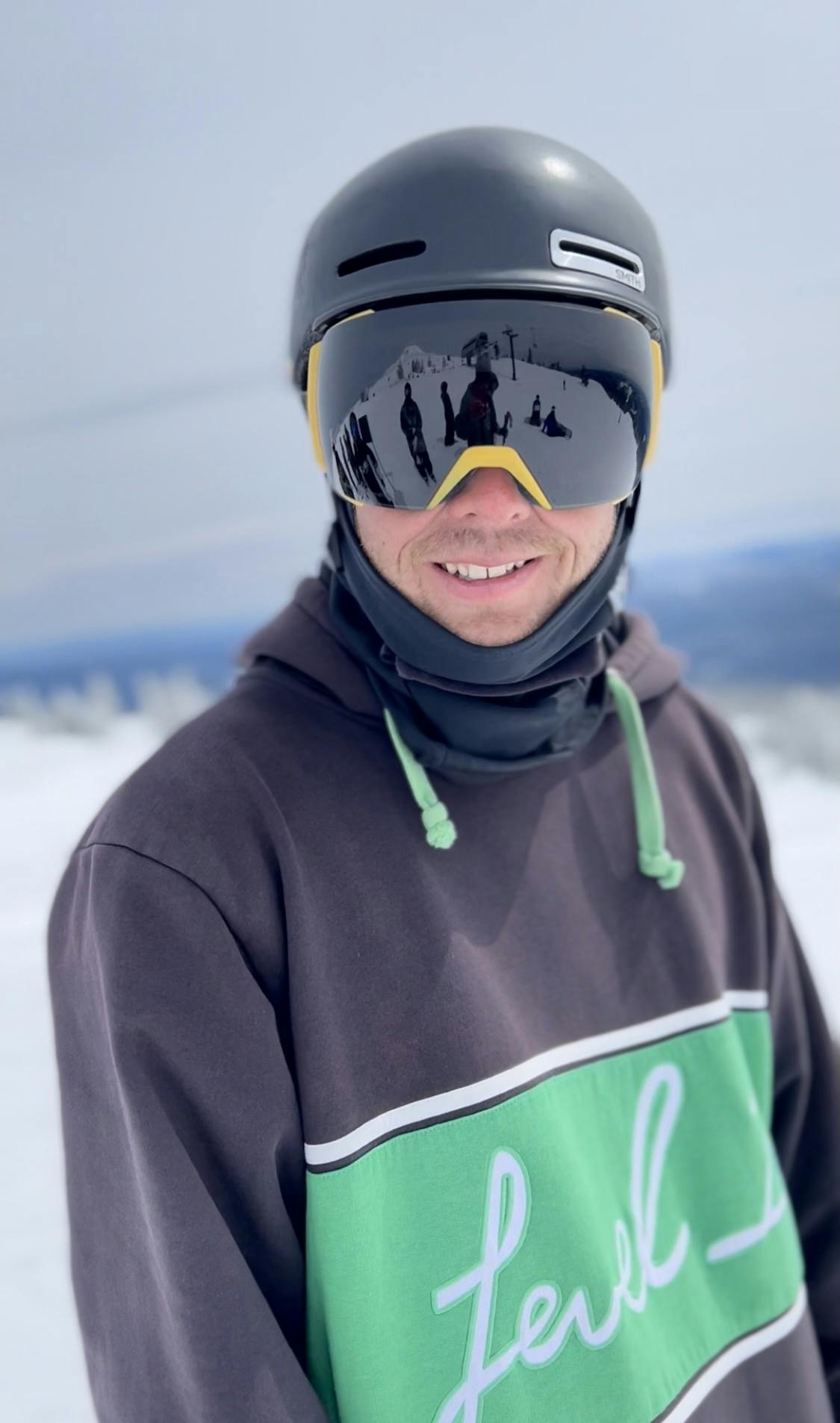 Close up of a skier wearing the Smith I/O MAG XL Goggles · 2021.