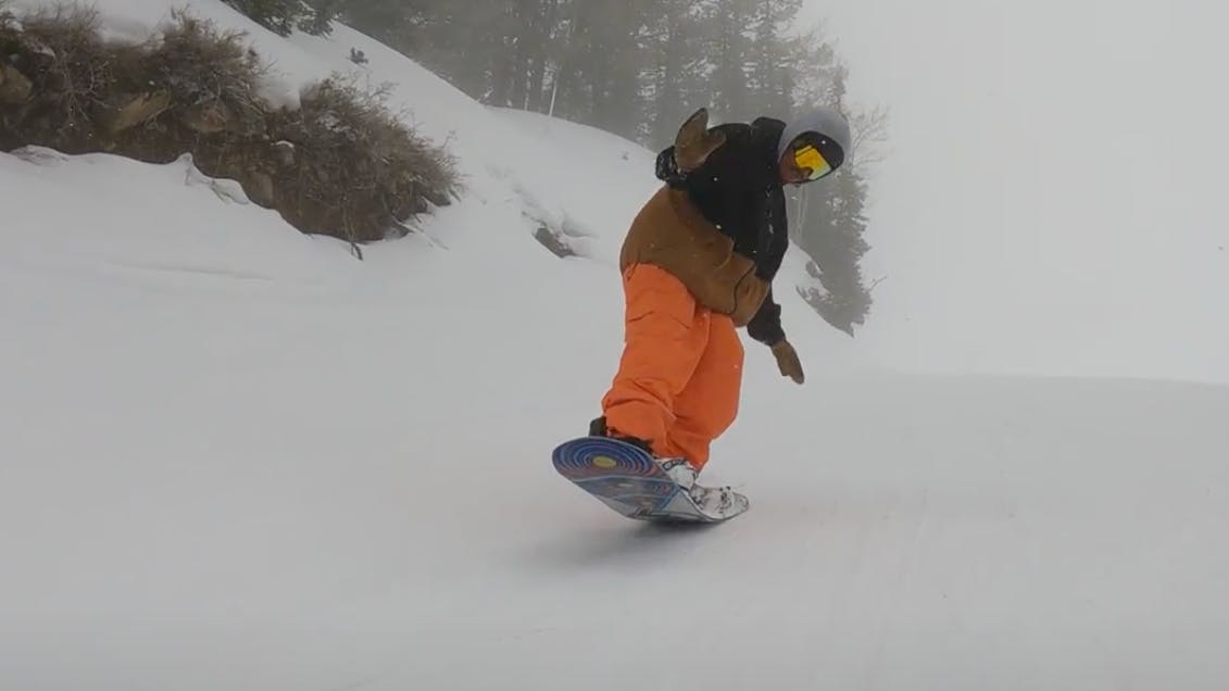 Snowboard Expert Yuri Czmola buttering on the 2023 Lib Tech T.Rice Pro snowboard