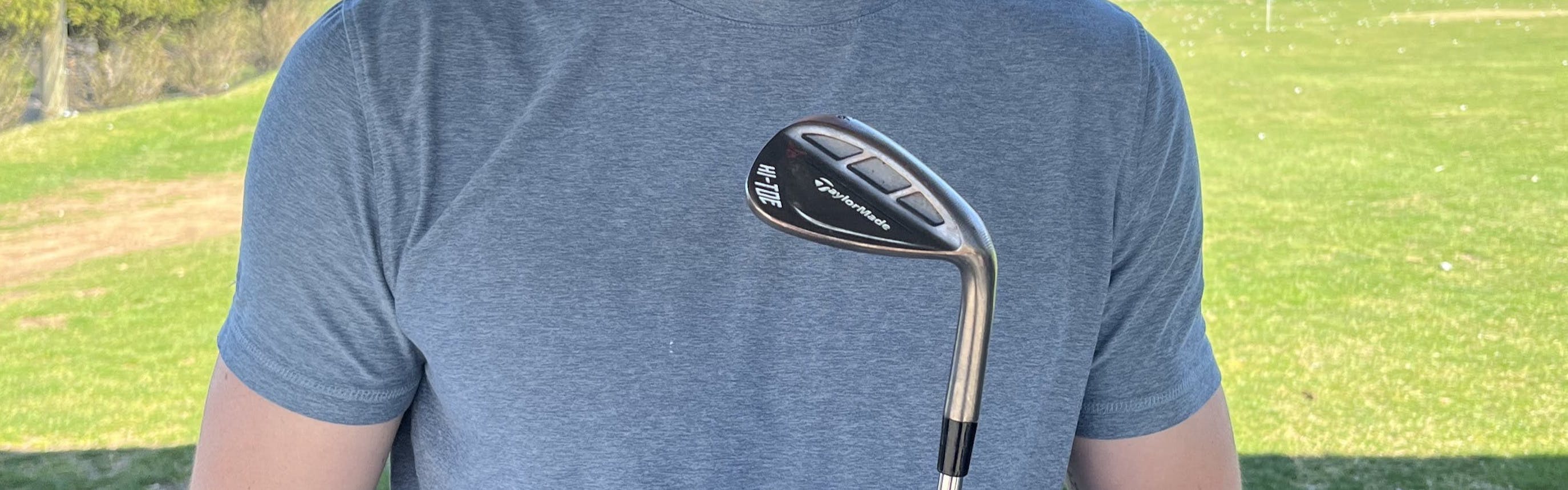 Man holds the TaylorMade MG Hi-Toe RAW Wedge.