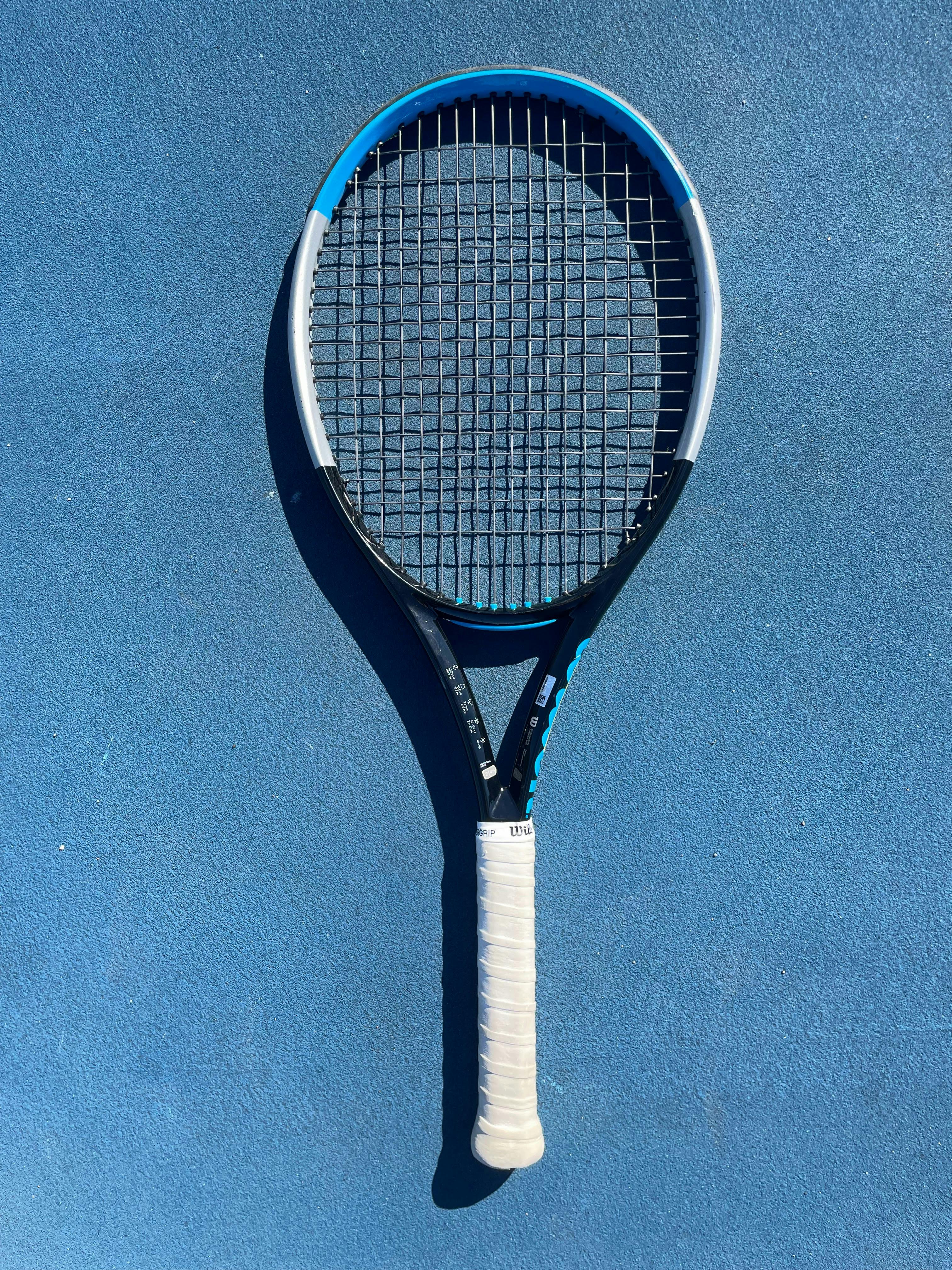 The Wilson Ultra 100 V3.0 Racquet.