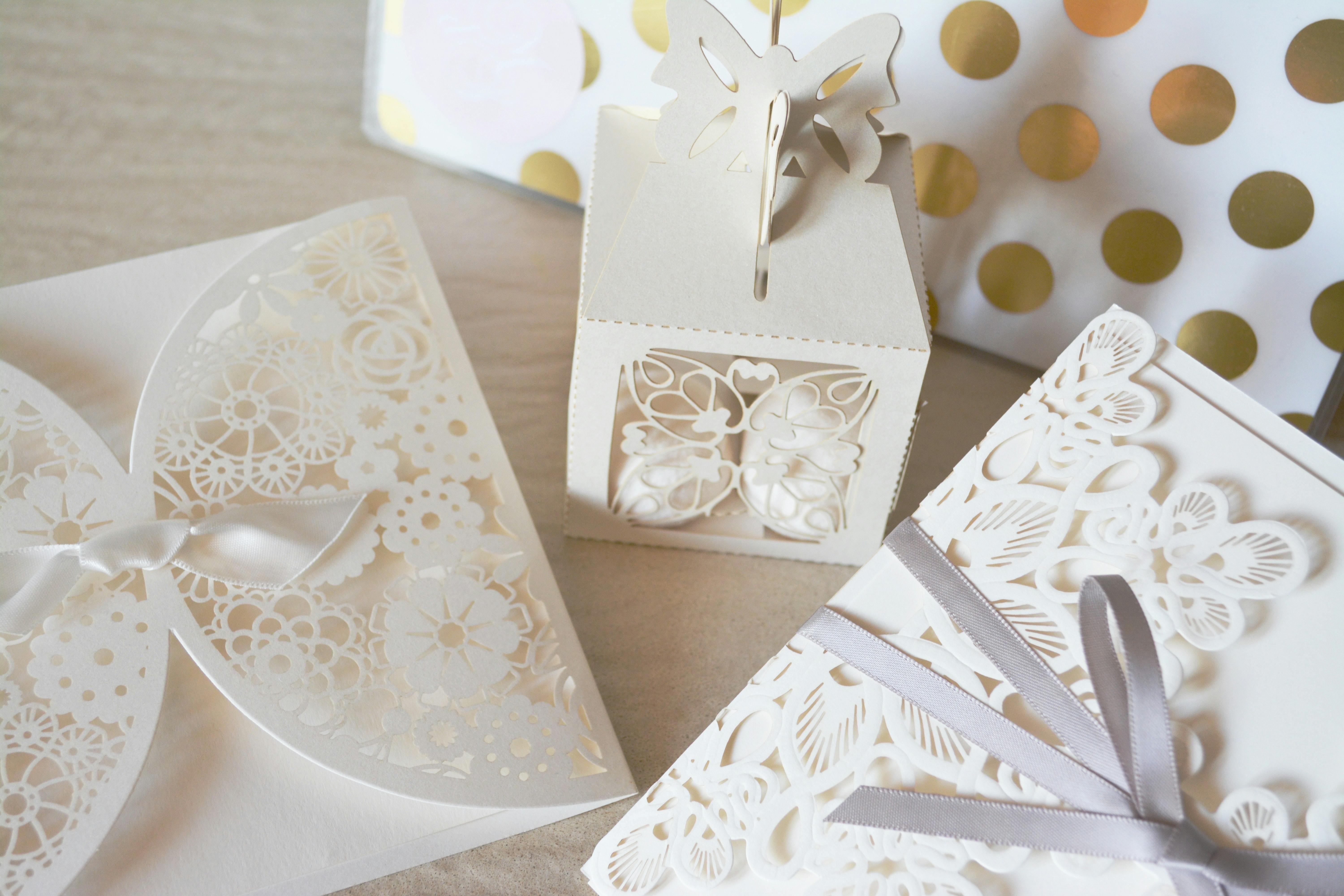 Some gifts wrapped in white boxes.