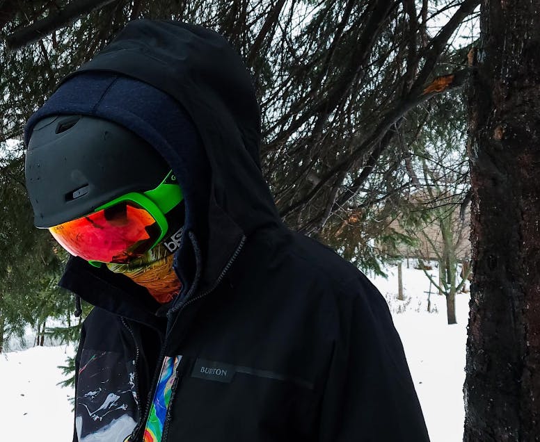A snowboarder wearing the  Giro Contact Goggles.